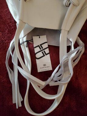 BELOW THE BELT WHITE LEATHER TOTE W/TASSELS NWT